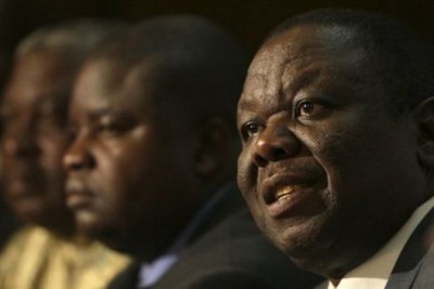 Morgan Tsvangirai addresses a press conference in Harare (fire photo).