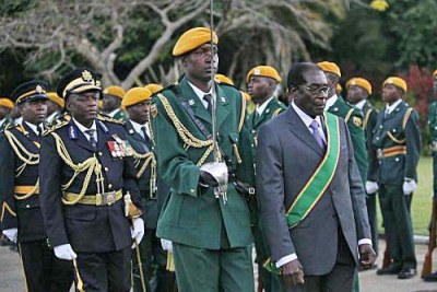 President Robert Mugabe and Zimbabwean soldiers.