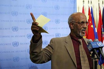Araya Desta, permanent representative of Eritrea to the United Nations, speaks to journalists following the Security Council's adoption of a resolution imposing an arms embargo on his country.