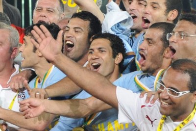 Egypt players celebrate winning during the 2010 Africa Cup of Nations final match.