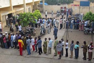Voters line up at the polls in Togo on Thursday.