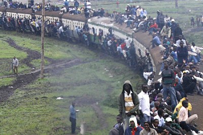 Nairobi commuters sit on top of a crowded an RVR passenger train (file photo).