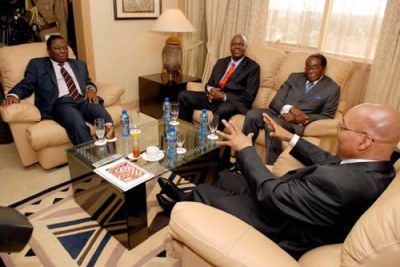 President Zuma meeting with President Robert Mugabe, Prime Minister Morgan Tsvangirai and Deputy Prime Minister Arthur Mutambara at the Rainbow Towers Hotel in Harare (file photo).