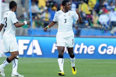 Asamoah Gyan of Ghana celebrates his goal against Australia.
