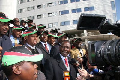 Eldoret North MP William Ruto addresses journalists outside the ICC building at The Hague on April 7.