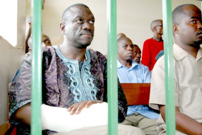 Dr Kizza Besigye at Nabweru Court before he was charged with unlawful assembly.