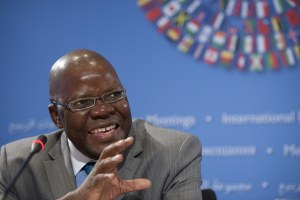 Tendai Biti, Zimbabwe's Finance minister, speaks with reporters during a news conference on Africa during the IMF World Bank spring meetings in Washington, Friday April 16, 2011.