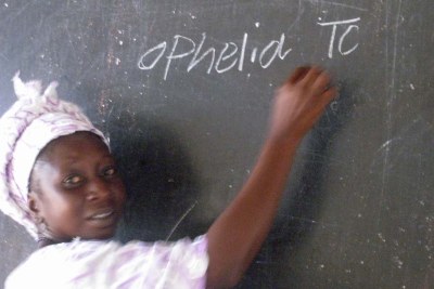 Ophelia Tengbeh learns how to spell her name