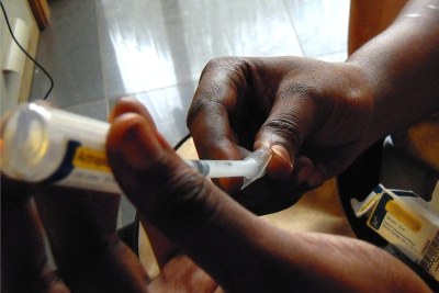 Close up of syringe for insulin injection. The number of diabetes cases is expected to double by the year 2030 in sub-Saharan Africa, fueled by urbanization, diet, poor access to health care, late diagnoses and lack of understanding.