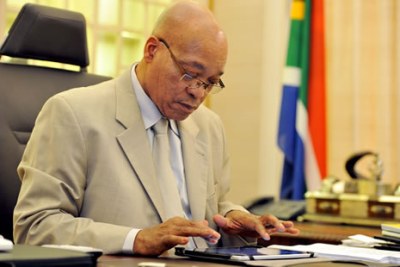 President Jacob Zuma puts the final touches to the speech he will deliver during the state of the nation address.