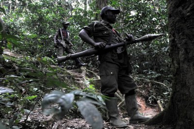 (Photo d'archives) - Des rebelles des FDLR dans la forêt de Pingu dans l'Est de la RDC, le 06/02/2009.