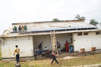 Local Villagers Installing Solar Panels