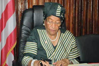 President Ellen Johnson Sirleaf signs into Law the 2012/2013 National Budget.