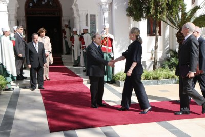U.S. Secretary of State Hillary Rodham Clinton shakes hands with Algerian President Abdelaziz Bouteflika in Algiers, Algeria,.