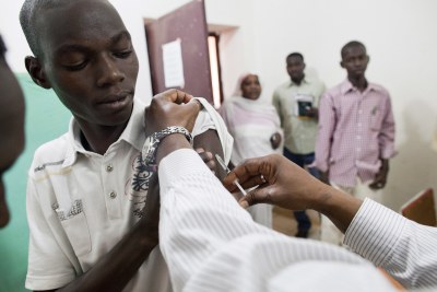 Hospital staff are inoculated against yellow fever before seeing patients (file photo).