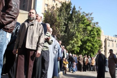 Voters wait to vote at a polling station in Qaliobeya (file photo).