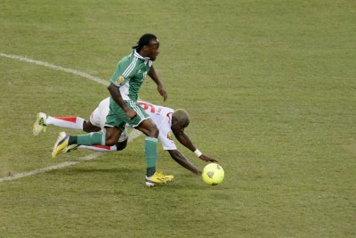 Victor Moses of Nigeria runs with the ball.