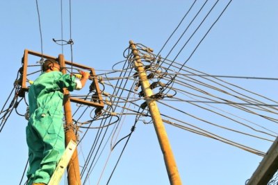 An electricity pylon  being repaired.