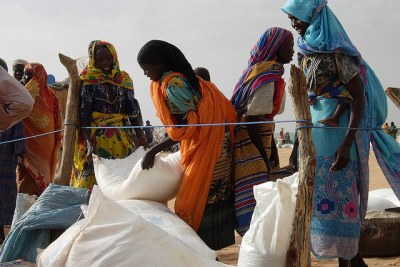 Sudanese refugees from the Darfur region of Sudan during food distribution at Iridimi camp, Chad.