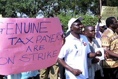 Teachers defy court order and vow to continue with strike over unpaid dues by the government (file photo).