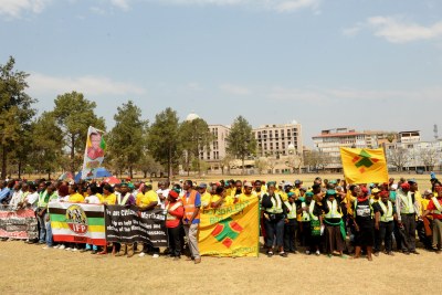 Protesters gather on the lawns below the Union Buildings in Pretoria in an attempt to get state funding for legal counsel at the inquiry investigating strike-related violence at Marikana (file photo).