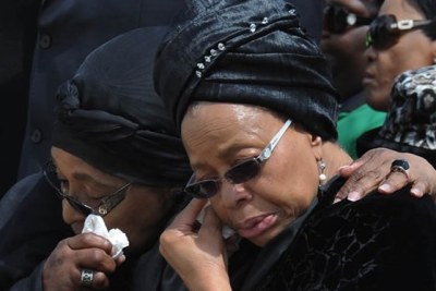 Graca Machel and Winnie Madikizela-Mandela at the arrival of the remains of former South African president Nelson Mandela (file photo).