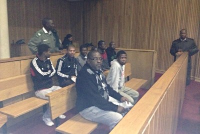 Jailed editor Bheki Makhubu (front left) waits for his bail hearing in the dock of courtroom A in Swaziland’s high court. At the last minute Makhubu’s hearing was shifted to court room B. It is unclear why his hearing was moved into another courtroom