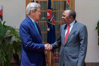 U.S. Secretary of State John Kerry shakes hands with Kenyan President Uhuru Kenyatta in Nairobi, Kenya on May 4, 2015.