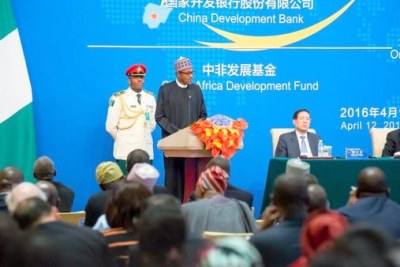 President Muhammadu Buhari speaking at the Official Opening Ceremony of the China-Nigeria Business Forum in Beijing, China (file photo).
