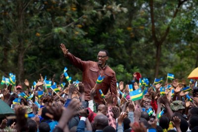 President Kagame waves to Ngoma residents during his visit to the district.