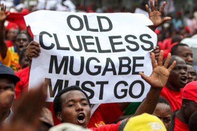 Thousands march against Mugabe.
