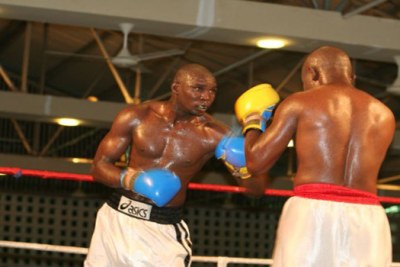 Hard fighting boxer Francis Cheka (left) touting Tanzania (file photo).