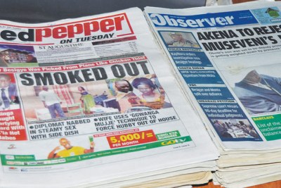 A cross section of newspapers on display.