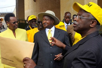 Mending fences. President Museveni (centre) with the First Lady Janet Museveni chat with the former prime minister and NRM secretary general Amama Mbabazi after the 2011 presidential election nominations at Namboole stadium.