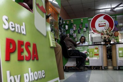 An M-Pesa agent and mobile phone shop in Nairobi (file photo)