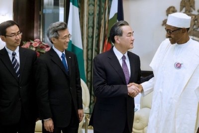 China’s Foreign Affairs minister Wang Yi and President Muhammadu Buhari.