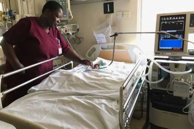Nurse Caroline Mwenesi attends to Samantha Pendo at Aga Khan Hospital in Kisumu.