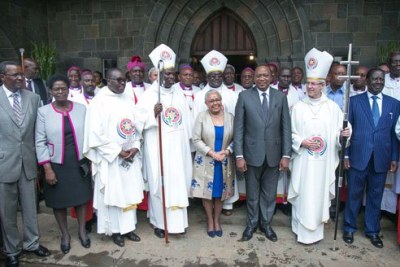President Uhuru Kenyatta (third right), First Lady Margaret Kenyatta, Nasa leader Raila Odinga (right) with the Archbishop of Canterbury, Justin Welby (second right), ACK Archbishop Jackson ole Sapit (fourth left), Chief Justice David Maraga (left) and his wife at the All Saints Cathedral during the church's first centenary celebrations.