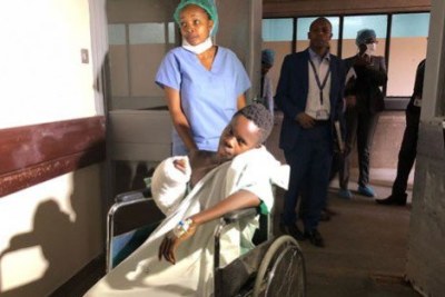 Joseph Theuri, 17, whose arm was chopped off by chaff cutter after a successful operation to replant severed limb at Kenyatta National Hospital.