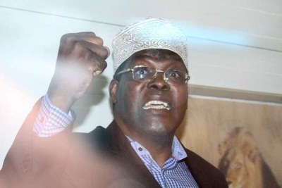 Lawyer Miguna Miguna protesting on March 26, 2018 at the Jomo Kenyatta International Airport, Nairobi, after he was blocked from entering the country because he refused to apply for citizenship. He was deported.