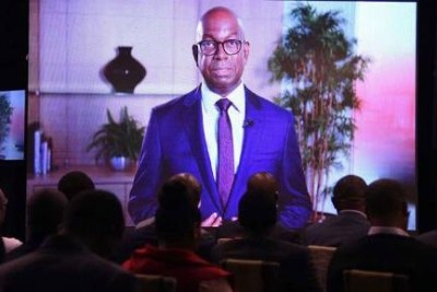 Safaricom CEO Bob Collymore addressing investors via video link during the company's full year investor briefing on May 9, 2018.