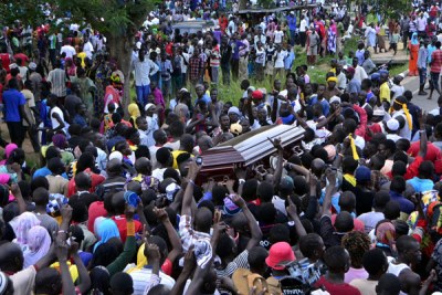 Mourners carry the casket bearing the remains of Ibrahim Abiriga in Arua town.