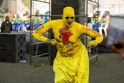 A fan celebrates at the opening of the Pan-African Film and Television Festival of Ouagadougou 2019.