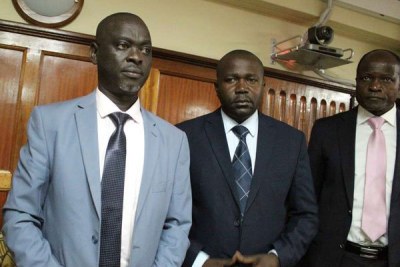 Migori Governor Okoth Obado (R), his personal assistant Michael Oyamo (C) and County Clerk Casper Obiero in a Nairobi Court on May 29, 2019, during the hearing of an application for judge Jessie Lessit to recuse herself from the case.
