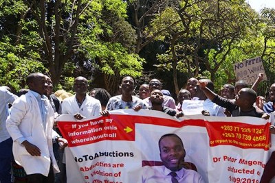 Zimbabwean health workers protest the disappearance of missing medical doctor and union leader Peter Magombeyi.