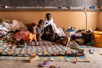 A displaced family from a village in Mali was relocated to a former school.