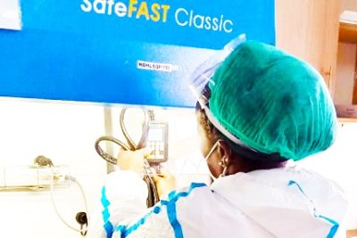 Beth Njaramba, a Biomedical Engineer, scans the filters of a Biological Safety Cabinet at a peripheral laboratory supported through the Amref Health Africa and the Mastercard Foundation COVID-19 Recovery and Resilience Program. The partnership will see county laboratories strengthened to screen more COVID-19 cases.