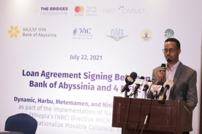Mesfin Guaguro , Ethiopia Program Lead, MSME, Mastercard Foundation, addresses the audience at the signing ceremony on Saturday, July 22, 2021