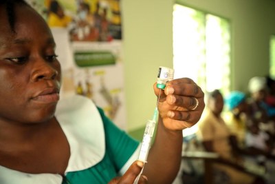 A health worker prepares the malaria vaccine (file photo).