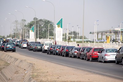 Petrol scarcity has worsened across Nigeria, sparked in part by the government's announcement in 2021 of an end to fuel subsidies. Rising prices worldwide are causing greater problems for consumers, like these queuing in Abuja - even though the country is the largest oil producer in Africa.